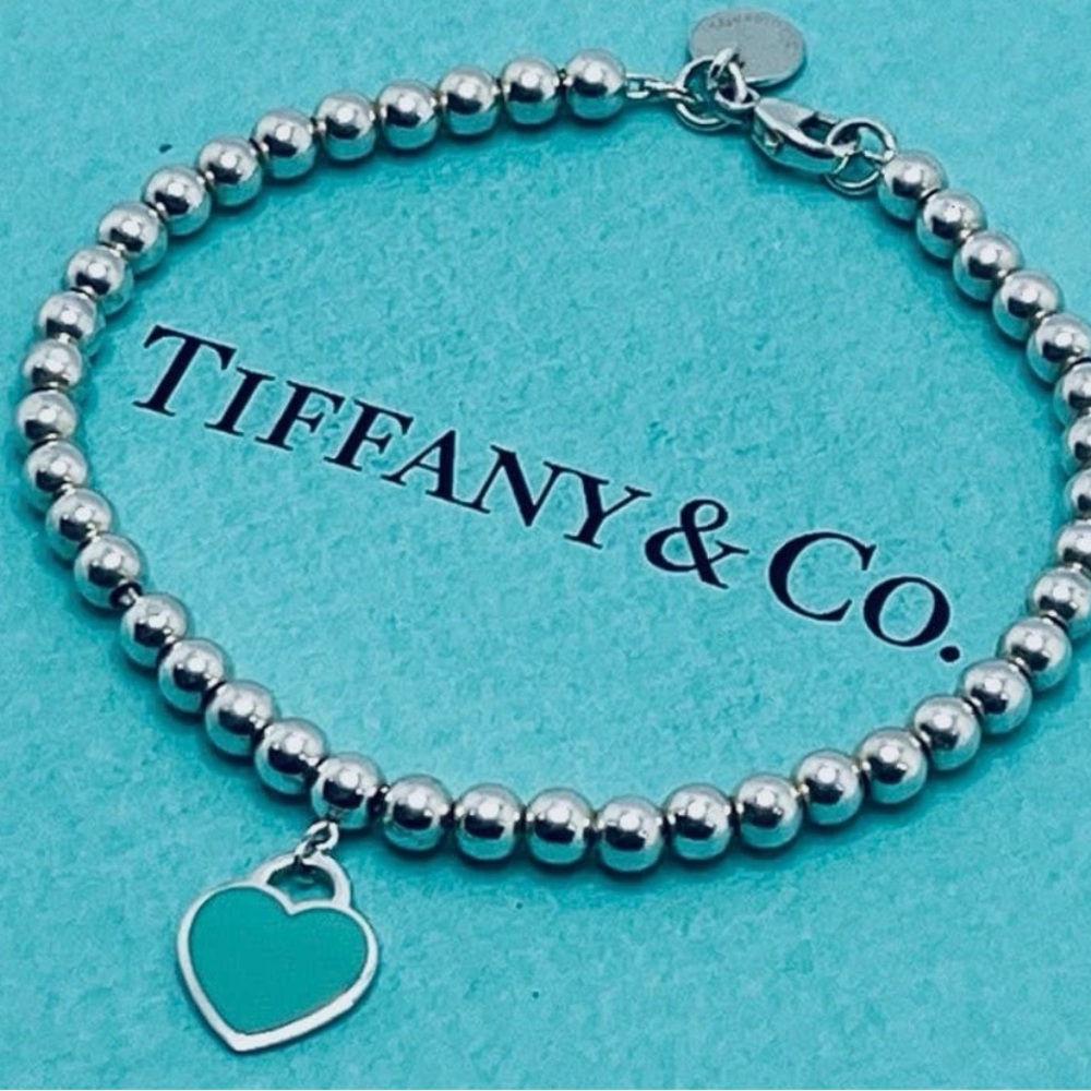 Tiffany & Co. Silver Bead Bracelet with Teal Heart Charm